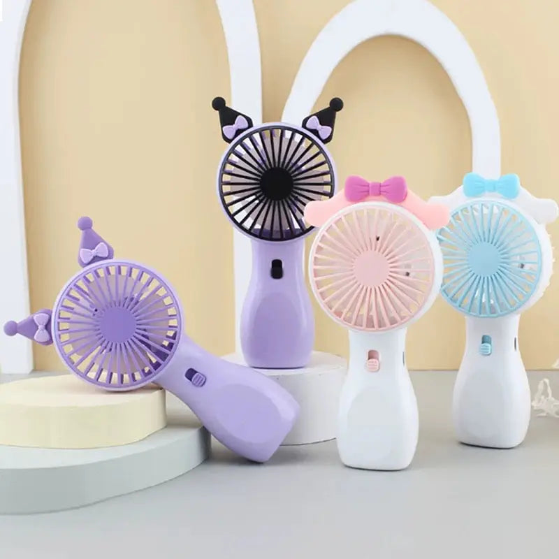 Mini ventilator pastel boje s mašnama i ručkama.