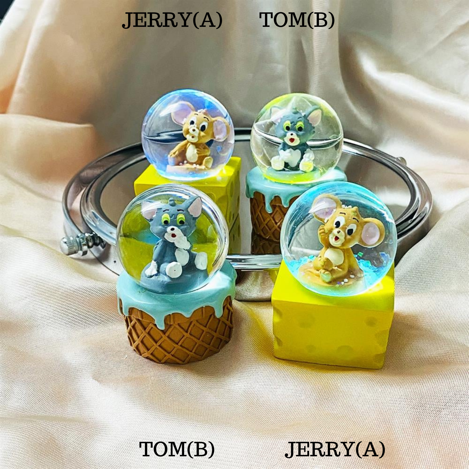 Tom and Jerry Kugla snow globes featuring iconic characters Tom and Jerry