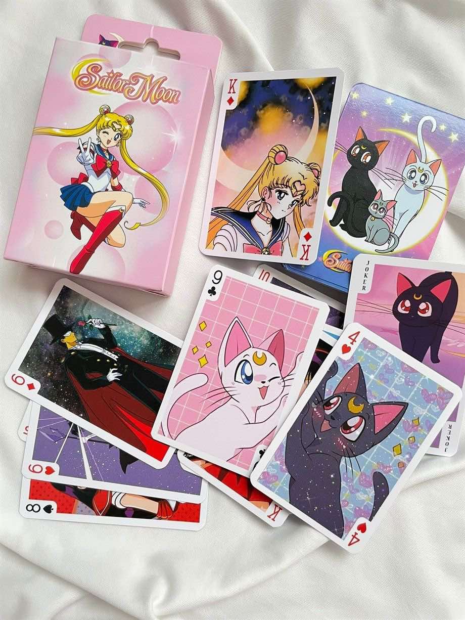 Sailor Moon Karte: anime likovi i mačke u živim bojama u ružičastoj kutiji