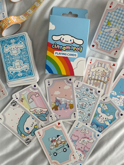 Cinnamoroll igra karte s ljupkim crtanim likovima u pastel bojama