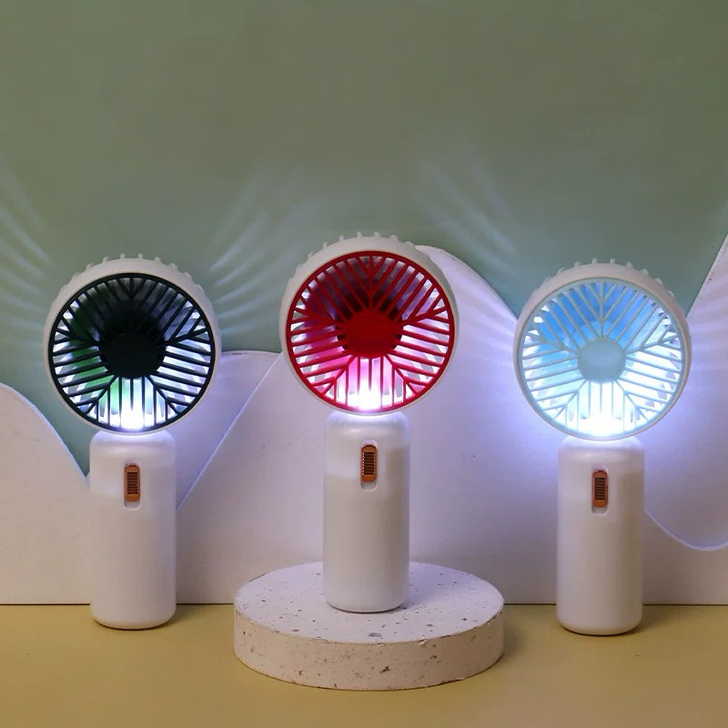 Bijeli prijenosni mini ventilator s LED svjetlima i elegantnim dizajnom