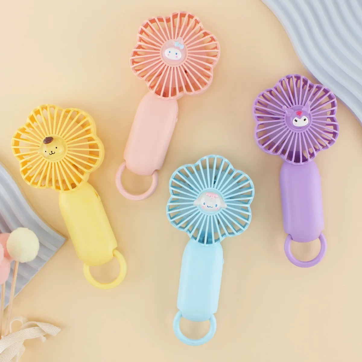 Žuti lavovski prijenosni ventilator Kuromi Mini s privjeskom