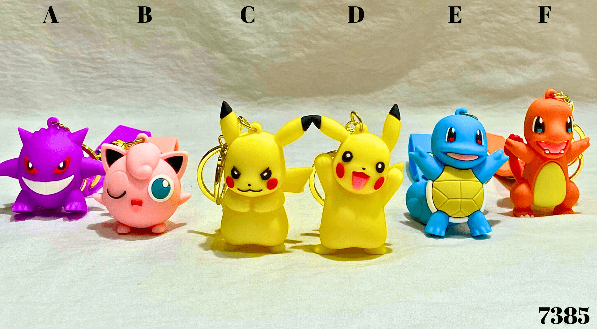 Pokémon privjesak s različitim Pokémon likovima na privjescima za ključeve