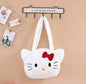 Bijela Hello Kitty plush torbica idealna za ljubitelje ovog simpatičnog junaka