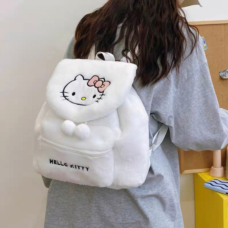 Bijela fluffy hello kitty plišana torbica s ružičastom mašnom i vezenim licem od mekanog pliša