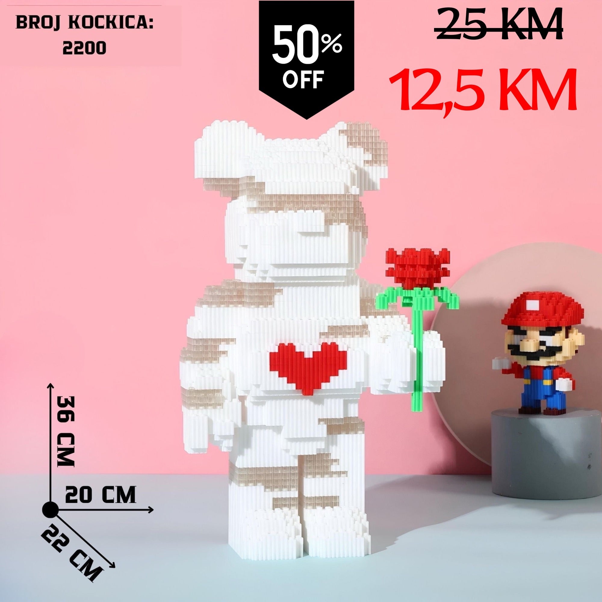 Bijeli pikselirani medvjed od 2200 Lego kockica drži crvenu ružu s srcem