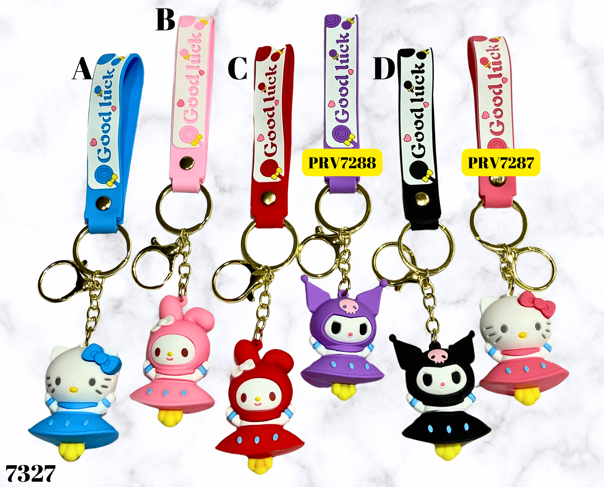 Veseli privjesci s animiranim likovima Hello Kitty i Kuromi na šarenim trakama