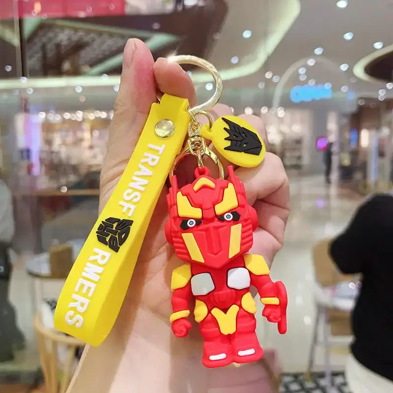 Crveni i žuti Transformers privjesak iz proizvoda TRANSFORMERS PRIVJESAK6