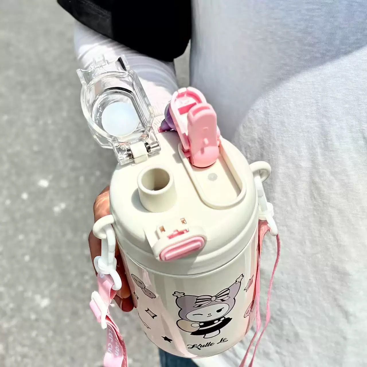 Cream-colored 600 ml stainless steel insulated bottle my melody kuromi with pink white clip lid and strap