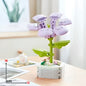 Lavender slaK lego flower with articulated petals green leaves and white base made of lego bricks