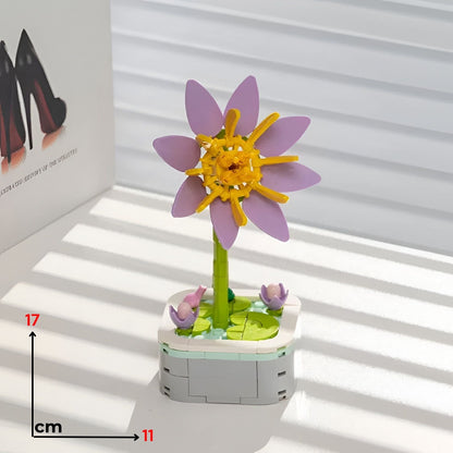 Lopoc vodeni ljiljana lego lavanda i žuti lotos od plastičnih kocaka na sivoj bazi sa zelenim lokvanjima
