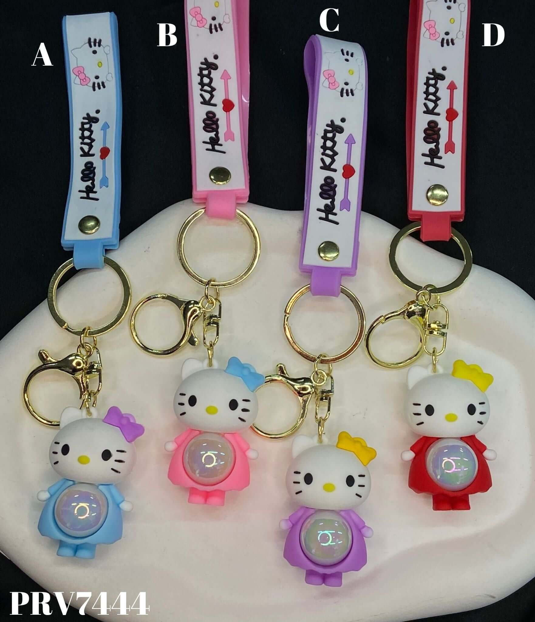 Šareni Hello Kitty privjesak s veselijim trakama savršeno dodatak za ljubitelje