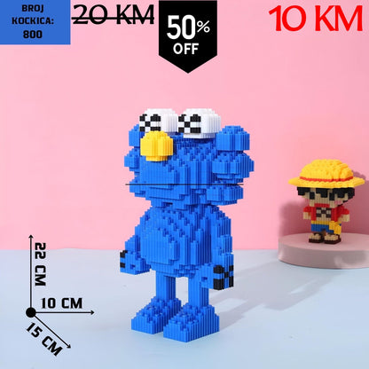 Plavi pikselirani Cookie Monster figurina s žutim nosom i šahovskim očima u SESAME STREET ELMO LEGO setu (800 kockica)