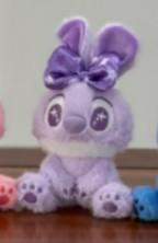 Plavi plišani stitch privjesak s ljubičastom mašnom na glavi i mekanim materijalom