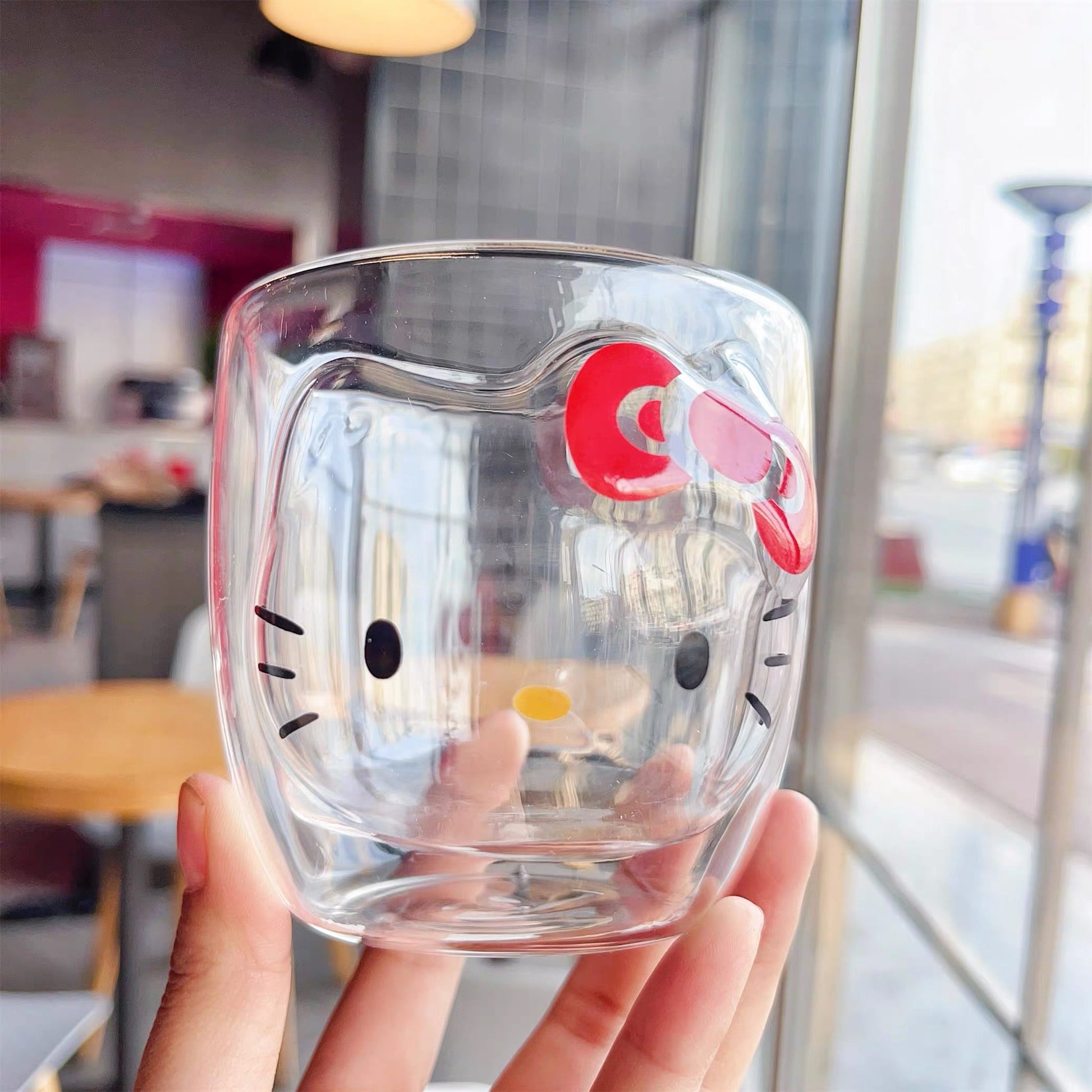 Hello Kitty čaša duplo staklo s crvenom mašnom i crnim očima
