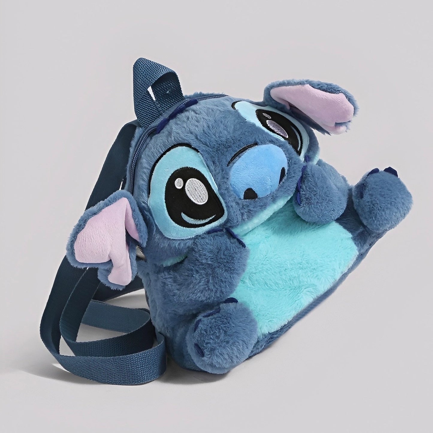 Plavi plišani stitch ruksak s ružičastim ušima i svijetloplavim trbušnim dijelom visok 26 cm