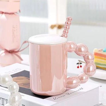 Pink keramička šolja iz Pearl keramička šolja set s perlastim ručkom i kašikom