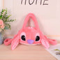 Roza plišana torbica stitch angel s mekanom tkaninom, ljubičastim nosom i crnim očima