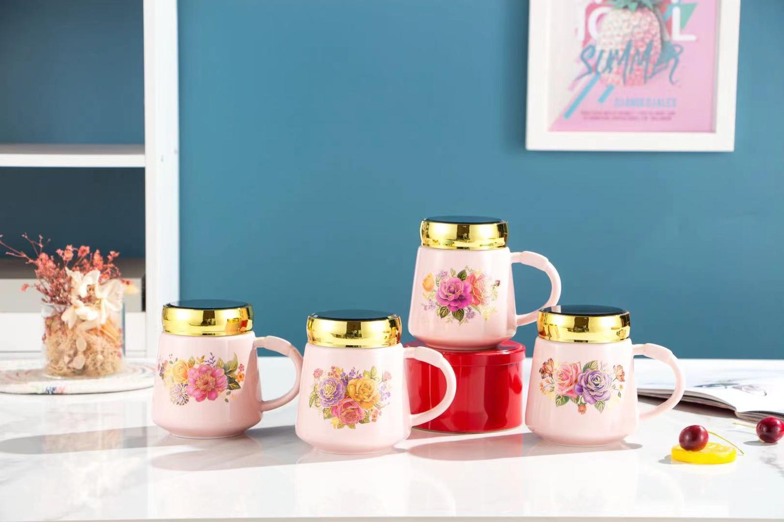 Floral-patterned pink cvijet keramička šolja with gold rims in a stylish set