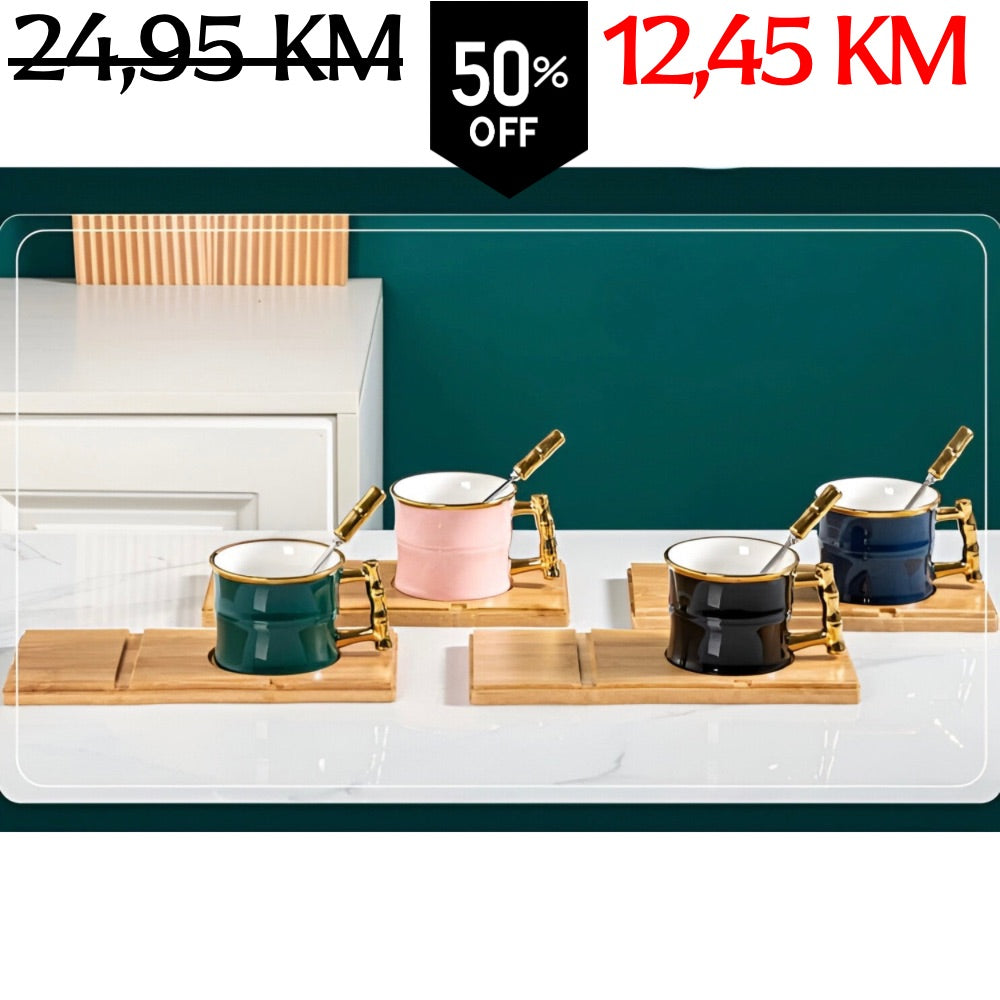 Set od tri retro keramičke šolje s zlatnim drškama, žlicama i bambusovom podlogom