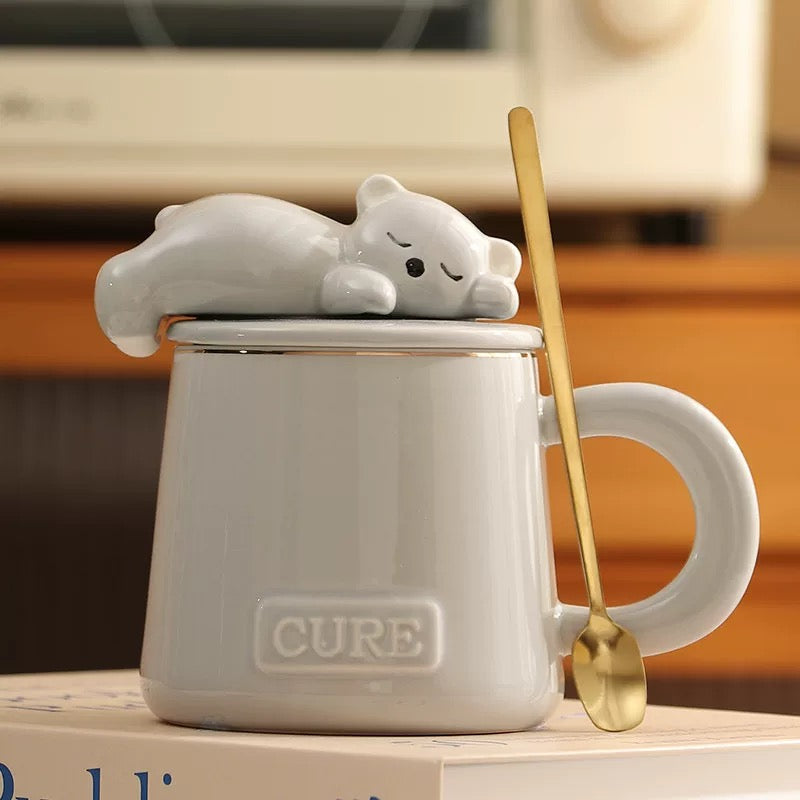 Gray Medo keramička šolja set s poklopcem u obliku uspavanog medvjeda i zlatnom kašikom