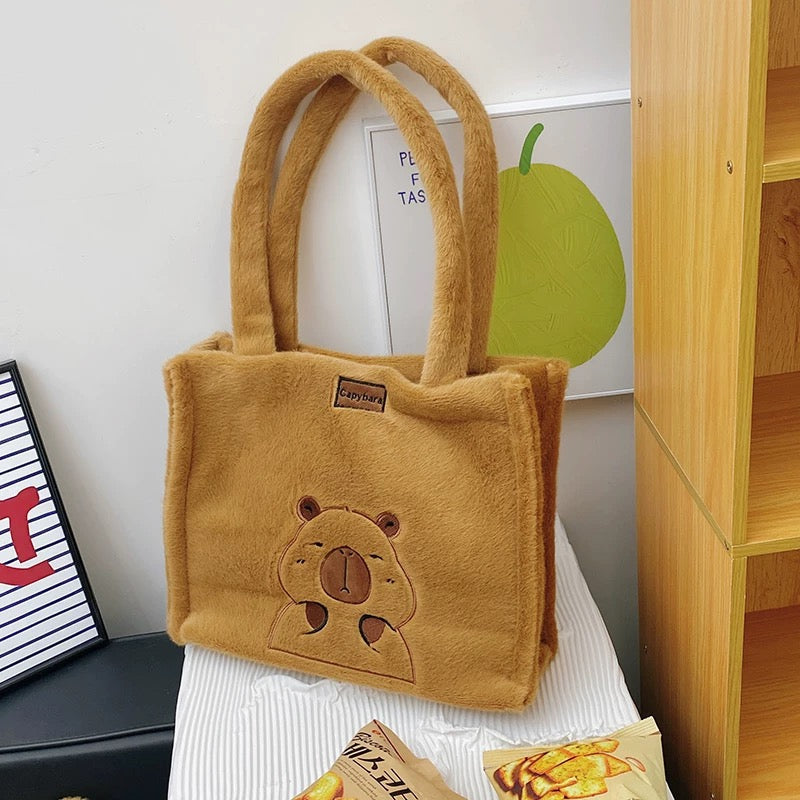 Brown plush tote bag with bear design from CAPYBARA PLIŠANA TORBICA collection