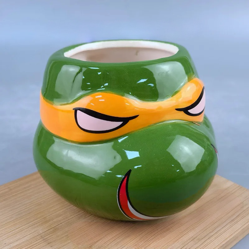 Zelena keramička šolja Mikelanjelo iz Ninja Turtles kolekcije