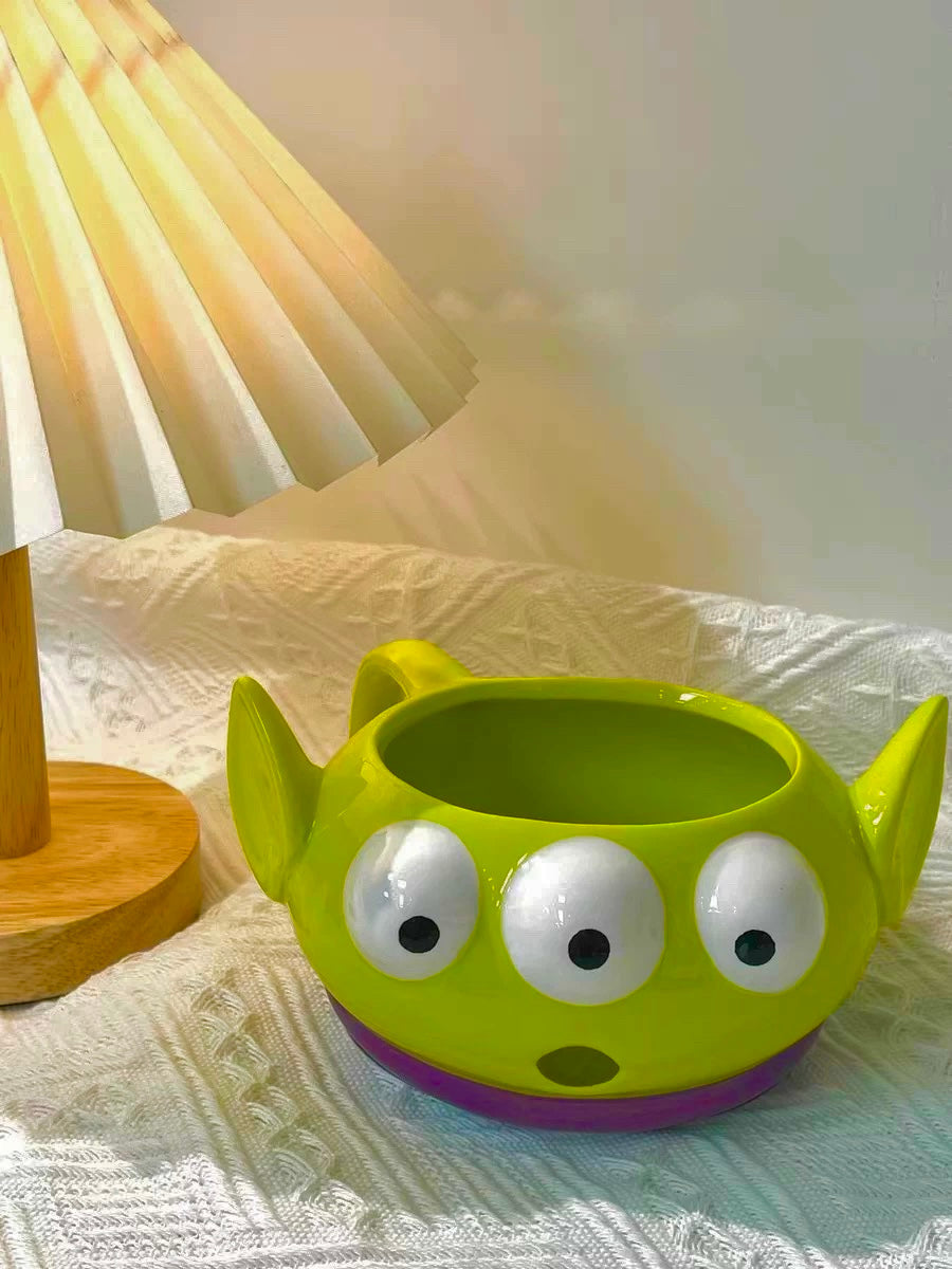Zelena keramička šolja s tri oka inspirirana Toy Storyjem