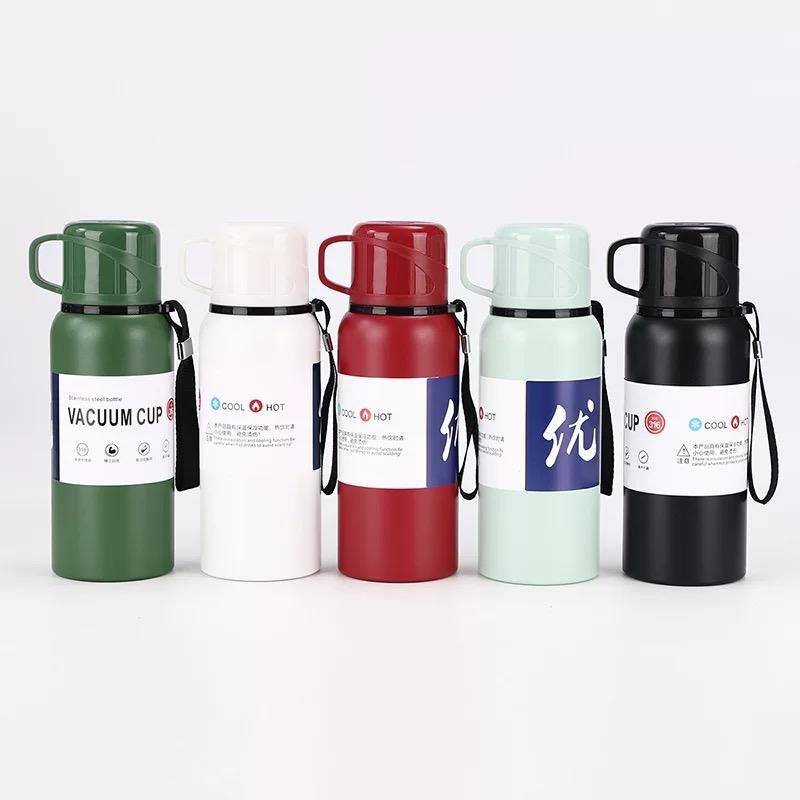 Zeleni Basic 800ml termos od nehrđajućeg čelika s bijelom ručkom i crnim remenom