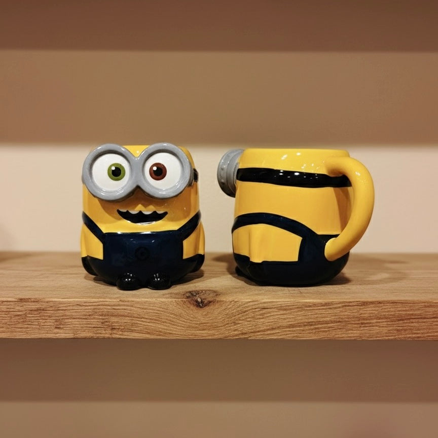 Žuta i crna minion šolja s jednim okom, keramička