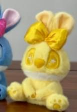 Stitch plišani privjesak žuti zec s sjajnom zlatnom mašnom na glavi